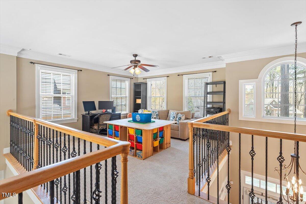 3504 Griffice Mill Road Raleigh, NC 27610 - Photo 24 of 39 a view of a dining room with furniture window and wooden floor