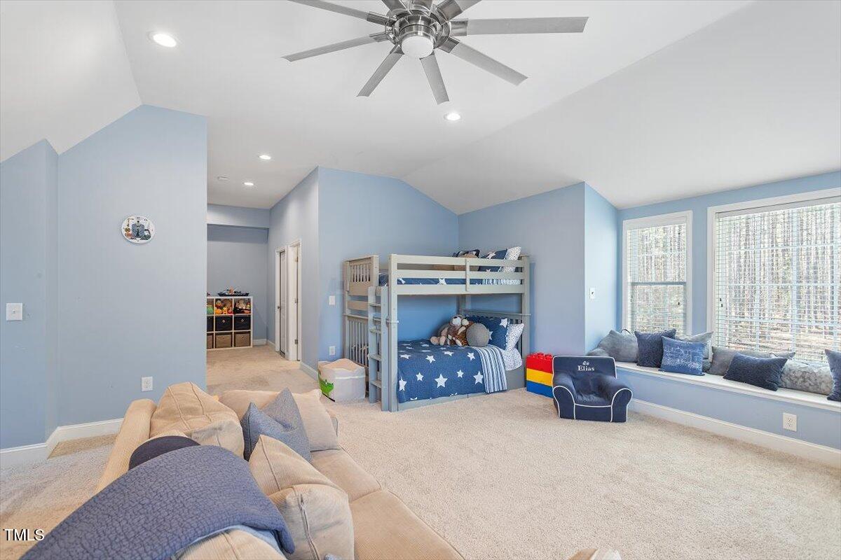 3504 Griffice Mill Road Raleigh, NC 27610 - Photo 27 of 39 a bed room with furniture and a window