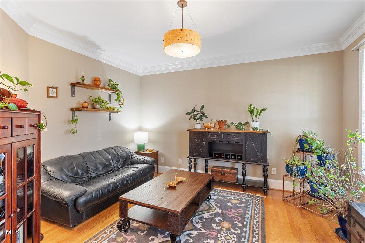 3504 Griffice Mill Road Raleigh, NC 27610 - Photo 4 of 39 a living room with furniture and a table