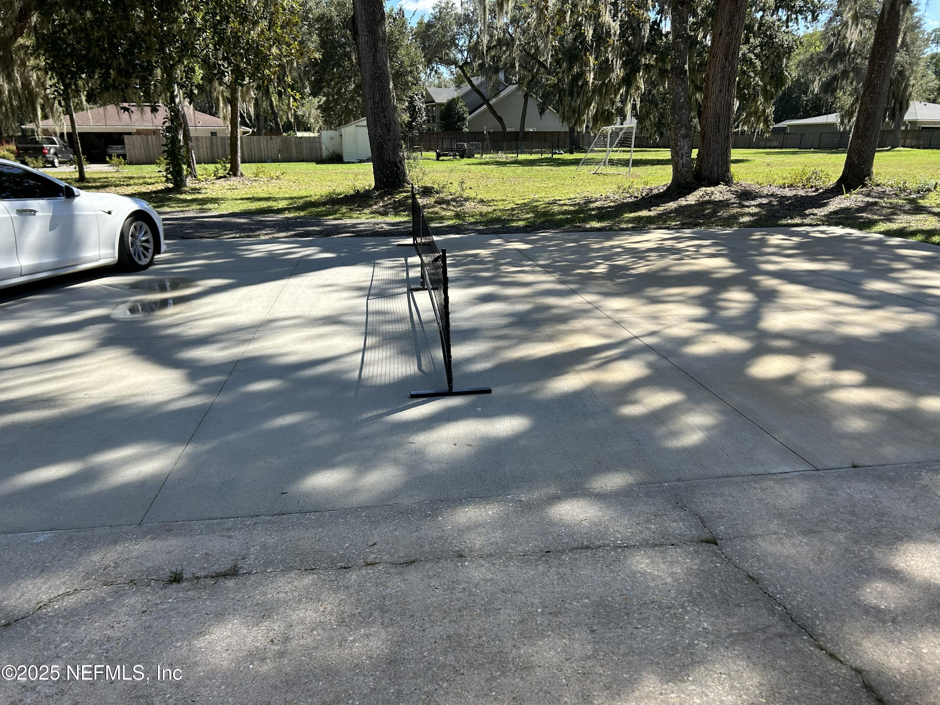 940 Myron Road Jacksonville, FL 32259 - Photo 14 of 20 a view of a park with swings and slides