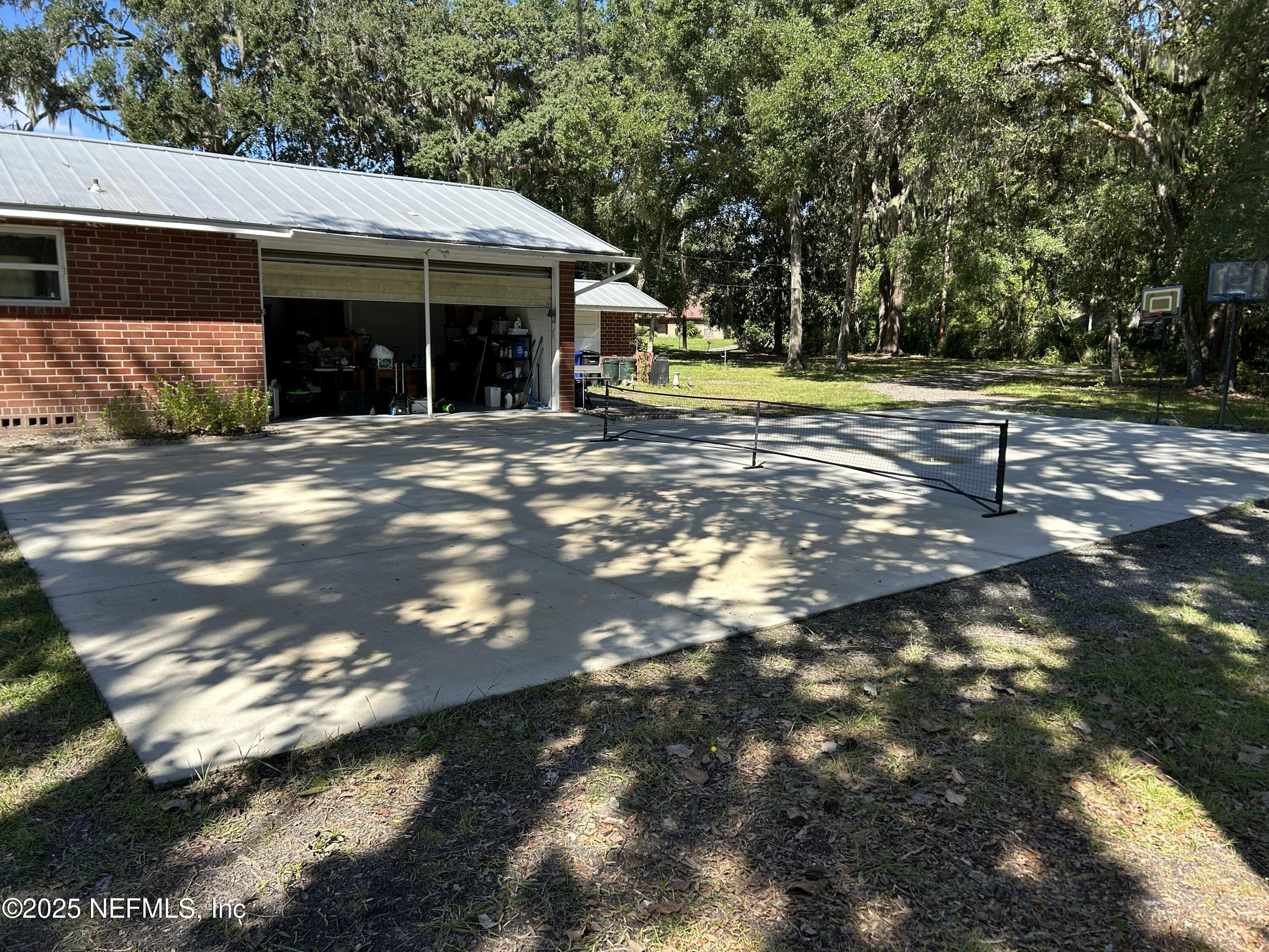 940 Myron Road Jacksonville, FL 32259 - Photo 16 of 20 a view of a house with a yard