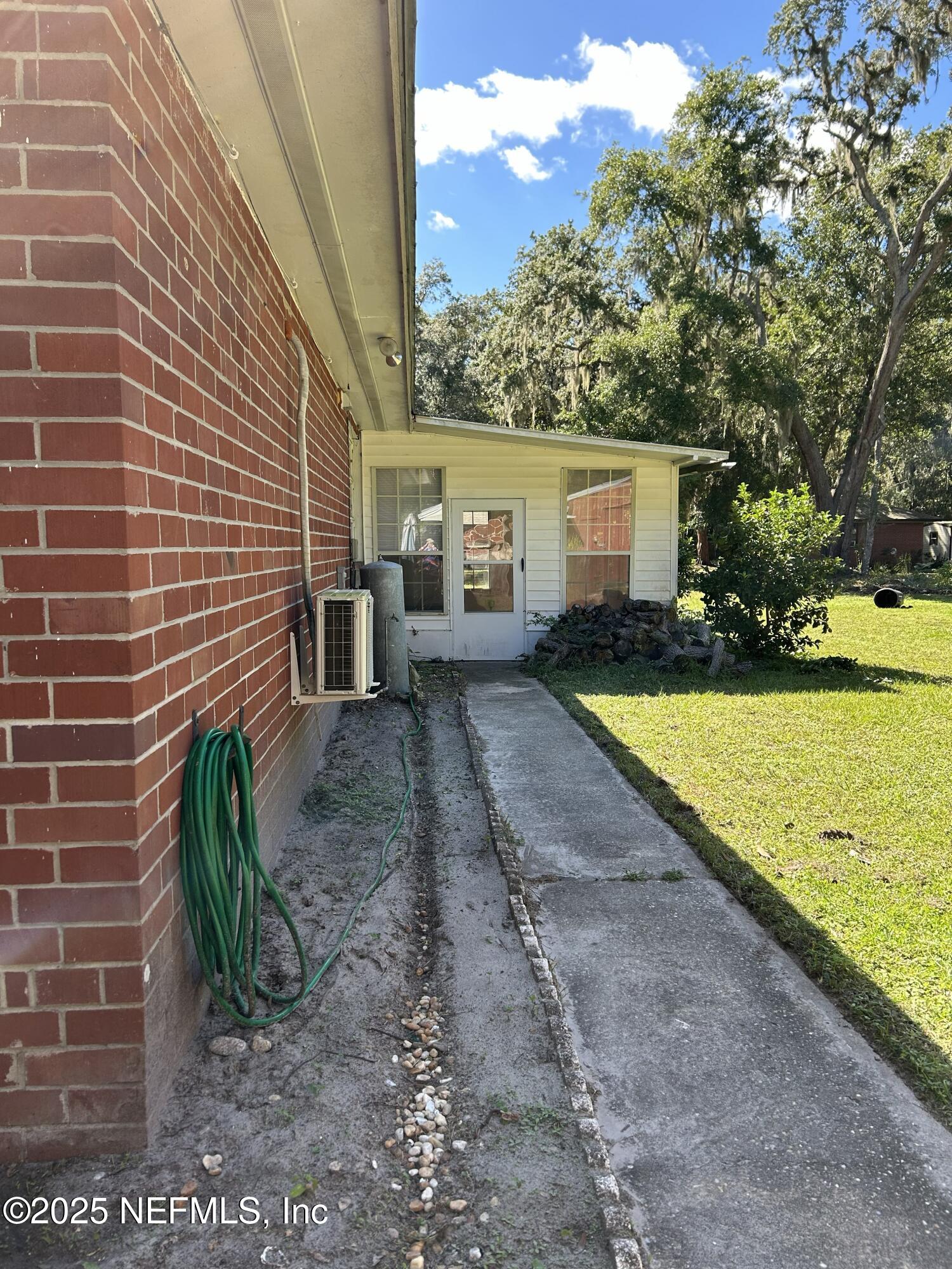 940 Myron Road Jacksonville, FL 32259 - Photo 17 of 20 a front view of a house with garden