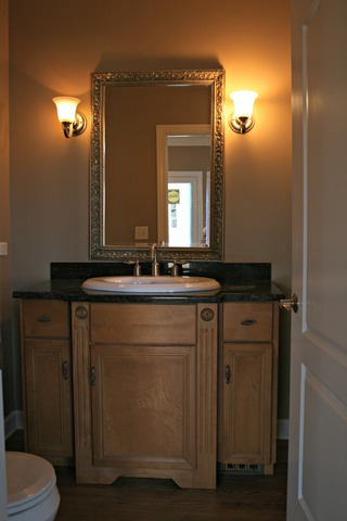 4115 Champion Road Naperville, IL 60564 - Photo 18 of 18 a bathroom with a sink and a mirror