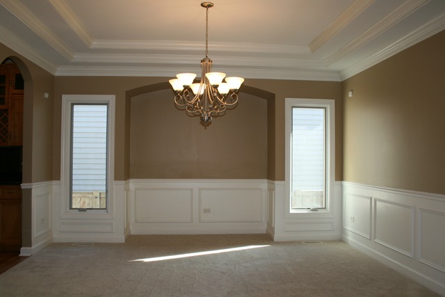 4115 Champion Road Naperville, IL 60564 - Photo 3 of 18 a view of a livingroom with a chandelier fan