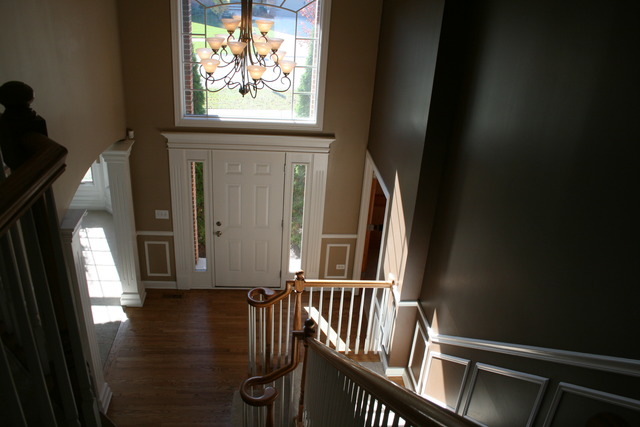 4115 Champion Road Naperville, IL 60564 - Photo 9 of 18 a view of entryway with wooden floor and door