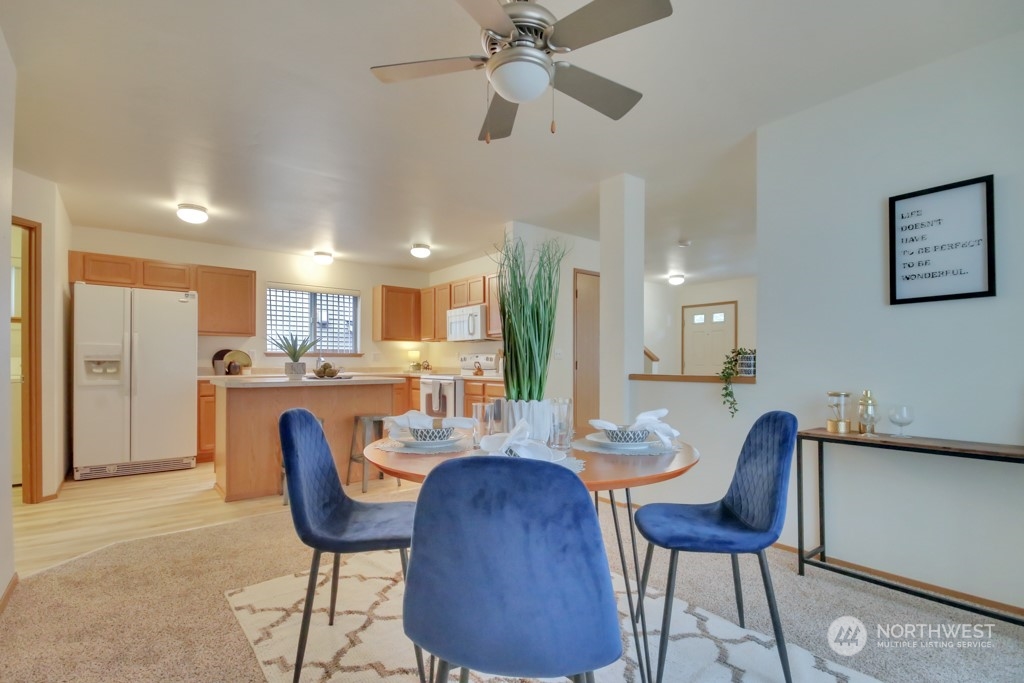 4010 East R Street Tacoma, WA 98404 - Photo 13 of 28 a dining room with furniture and window
