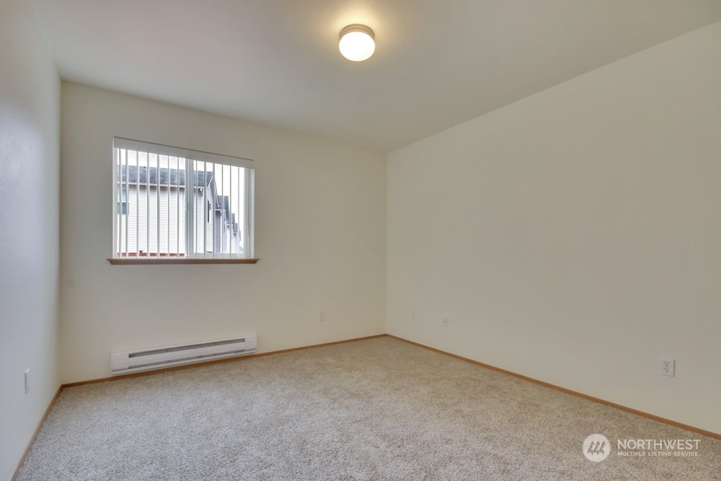 4010 East R Street Tacoma, WA 98404 - Photo 16 of 28 an empty room with a window