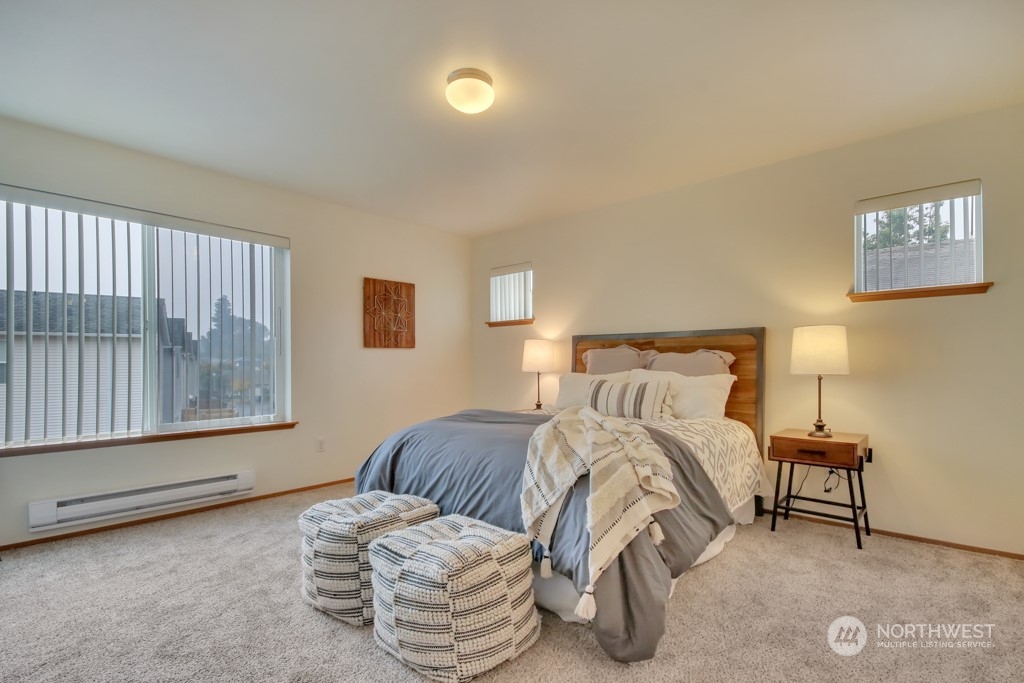 4010 East R Street Tacoma, WA 98404 - Photo 20 of 28 a bedroom with a bed and a window