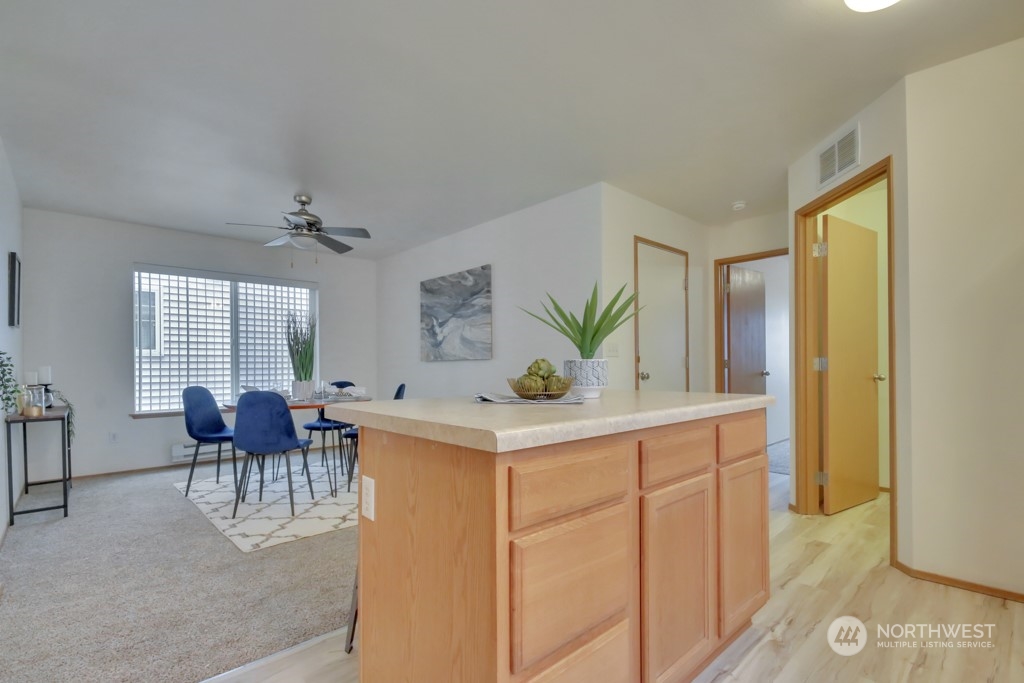 4010 East R Street Tacoma, WA 98404 - Photo 10 of 28 a view living room with stainless steel appliances granite countertop furniture and a window