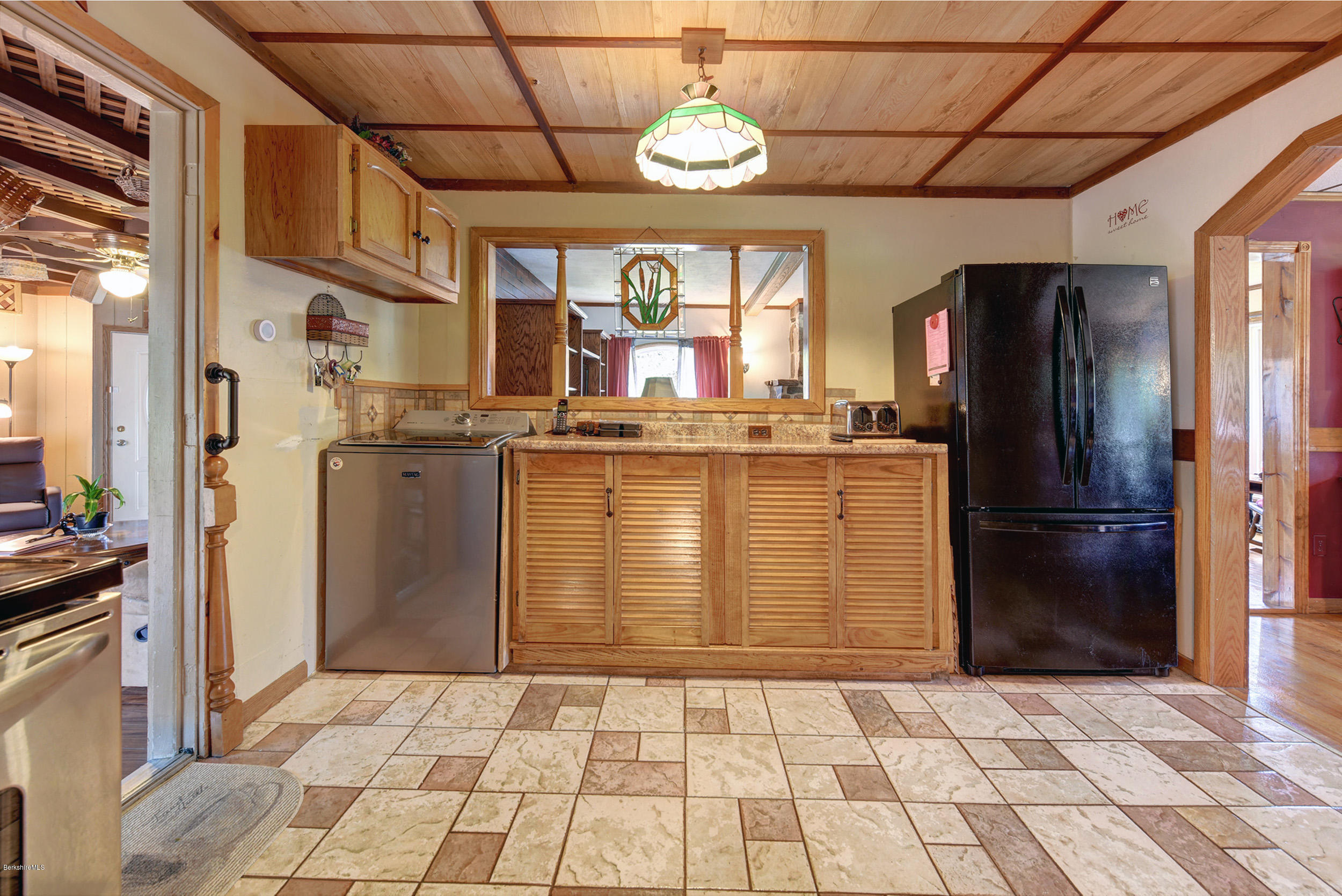 373 Haskins Road Savoy, MA 01256 - Photo 14 of 34 a kitchen with stainless steel appliances granite countertop a refrigerator a stove a sink dishwasher and a refrigerator