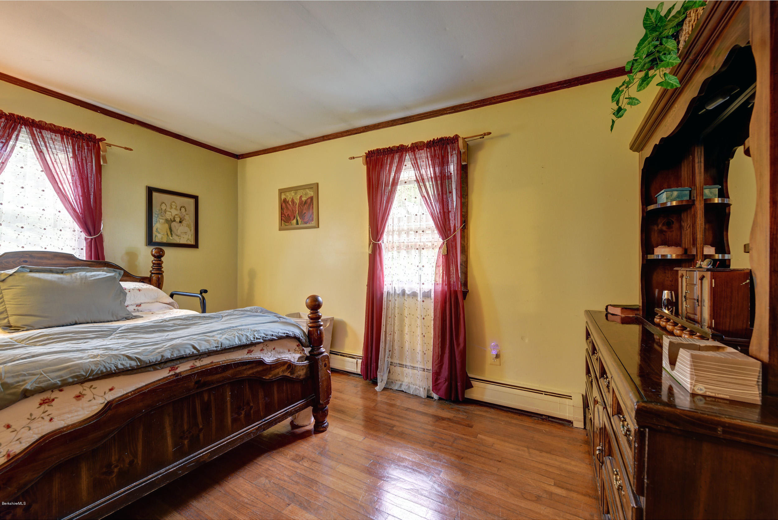 373 Haskins Road Savoy, MA 01256 - Photo 15 of 34 a bedroom with a bed next to a window
