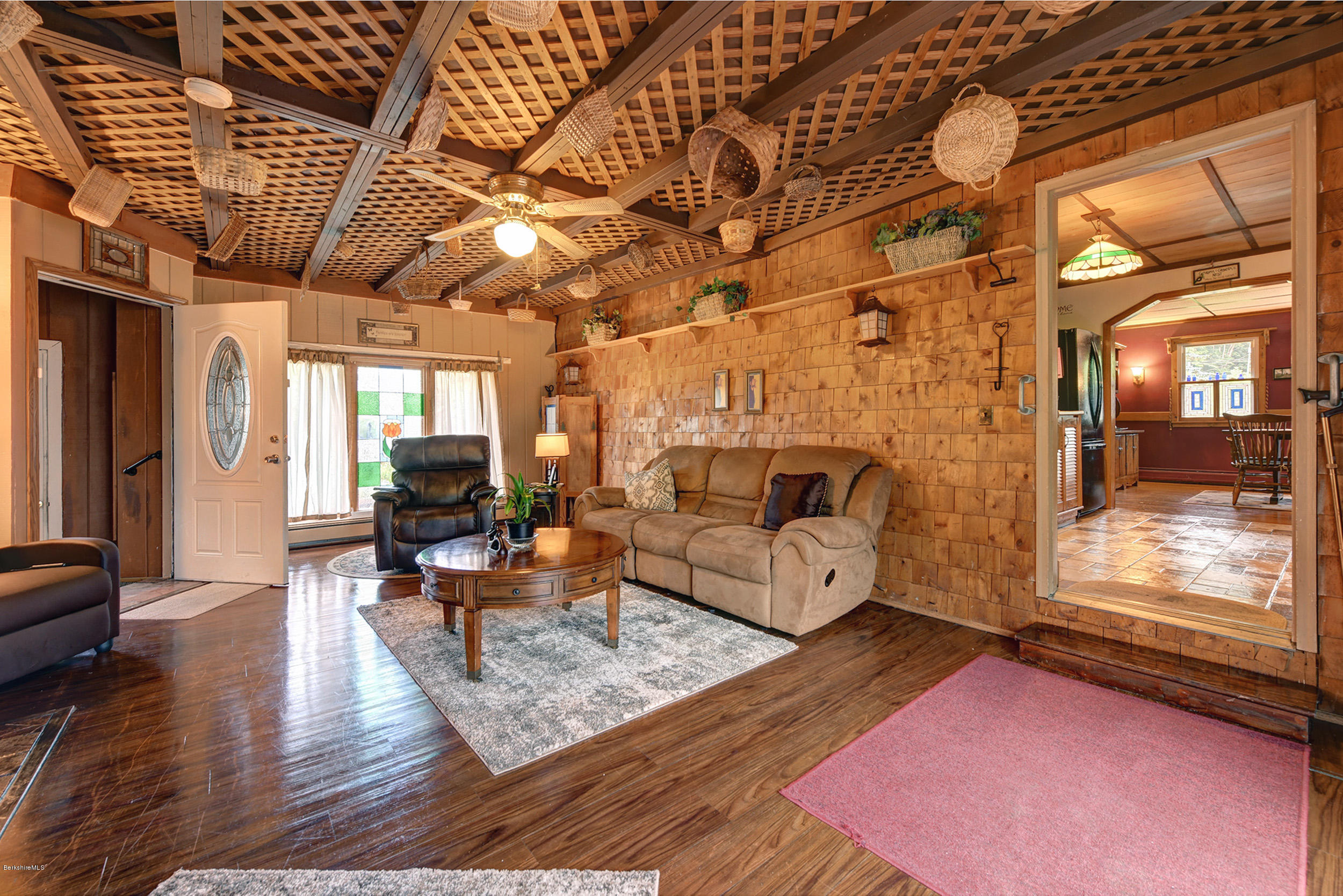 373 Haskins Road Savoy, MA 01256 - Photo 3 of 34 a living room with furniture and a fireplace