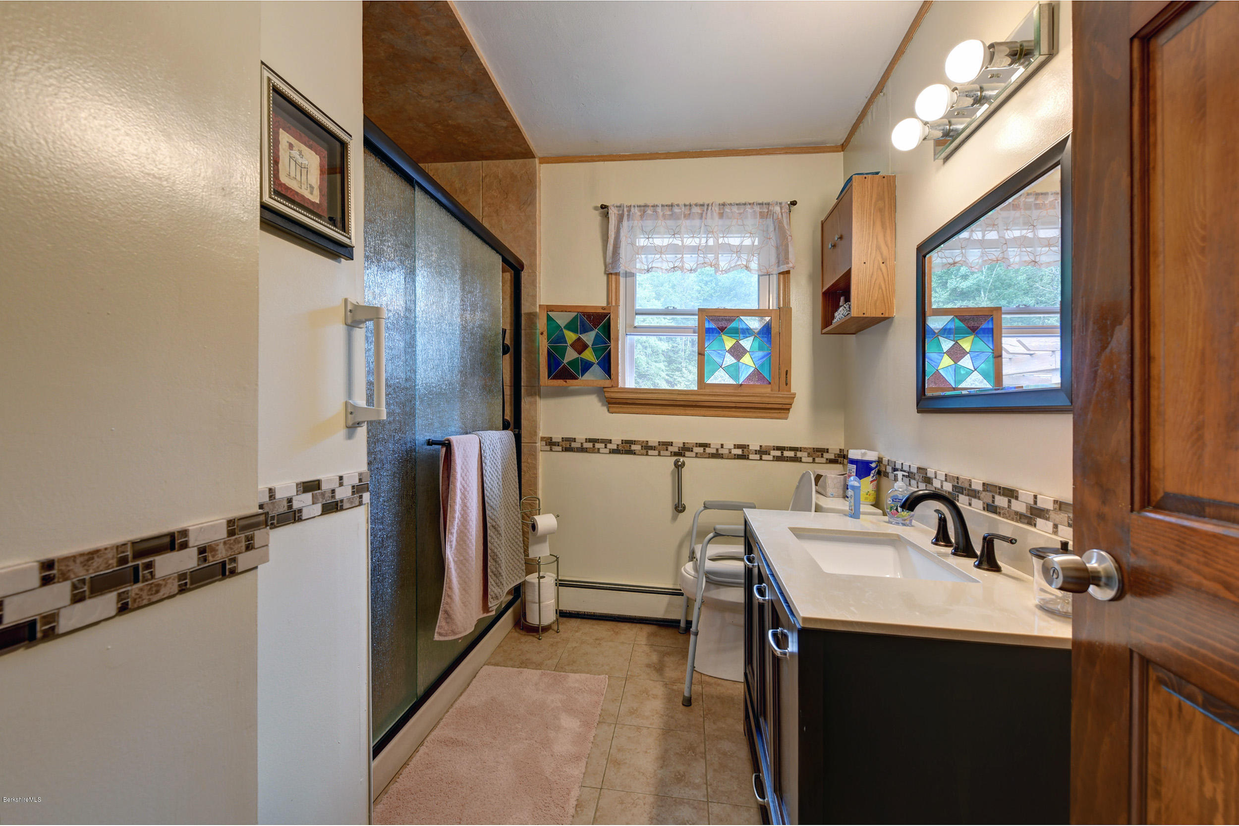 373 Haskins Road Savoy, MA 01256 - Photo 21 of 34 a bathroom with a sink and a mirror