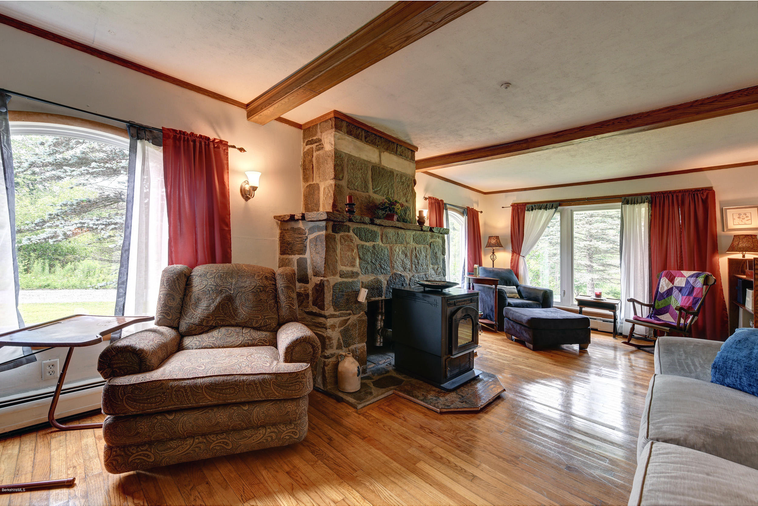 373 Haskins Road Savoy, MA 01256 - Photo 6 of 34 a living room with furniture or couch and a large window