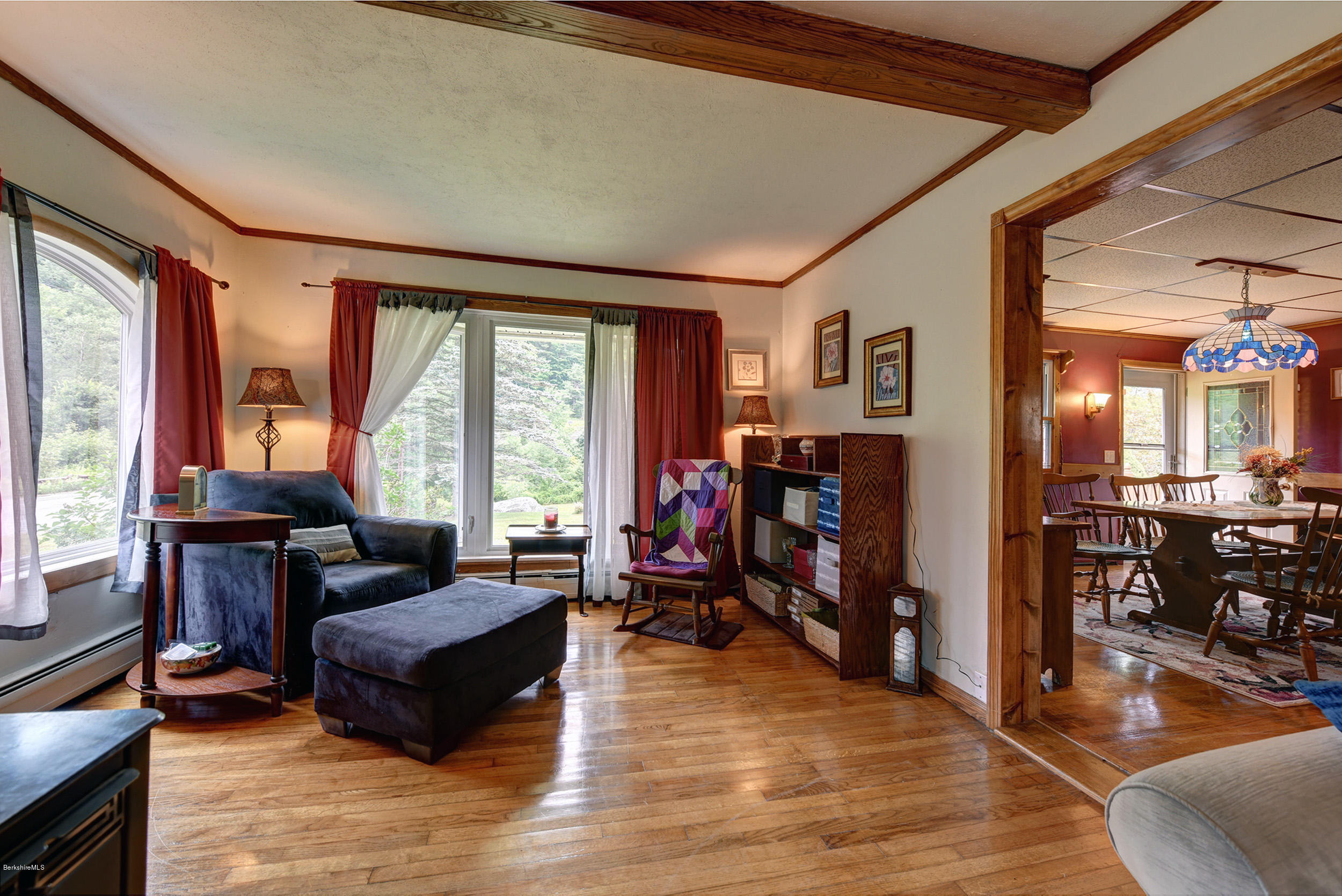 373 Haskins Road Savoy, MA 01256 - Photo 7 of 34 a living room with furniture and a large window
