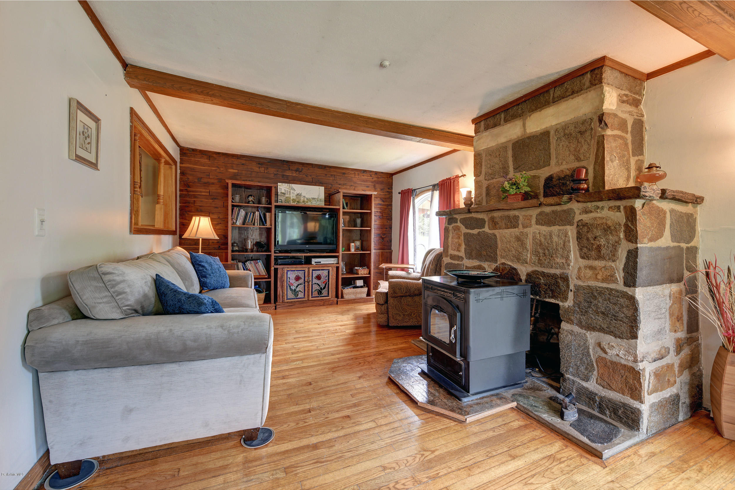 373 Haskins Road Savoy, MA 01256 - Photo 8 of 34 a living room with furniture and a flat screen tv