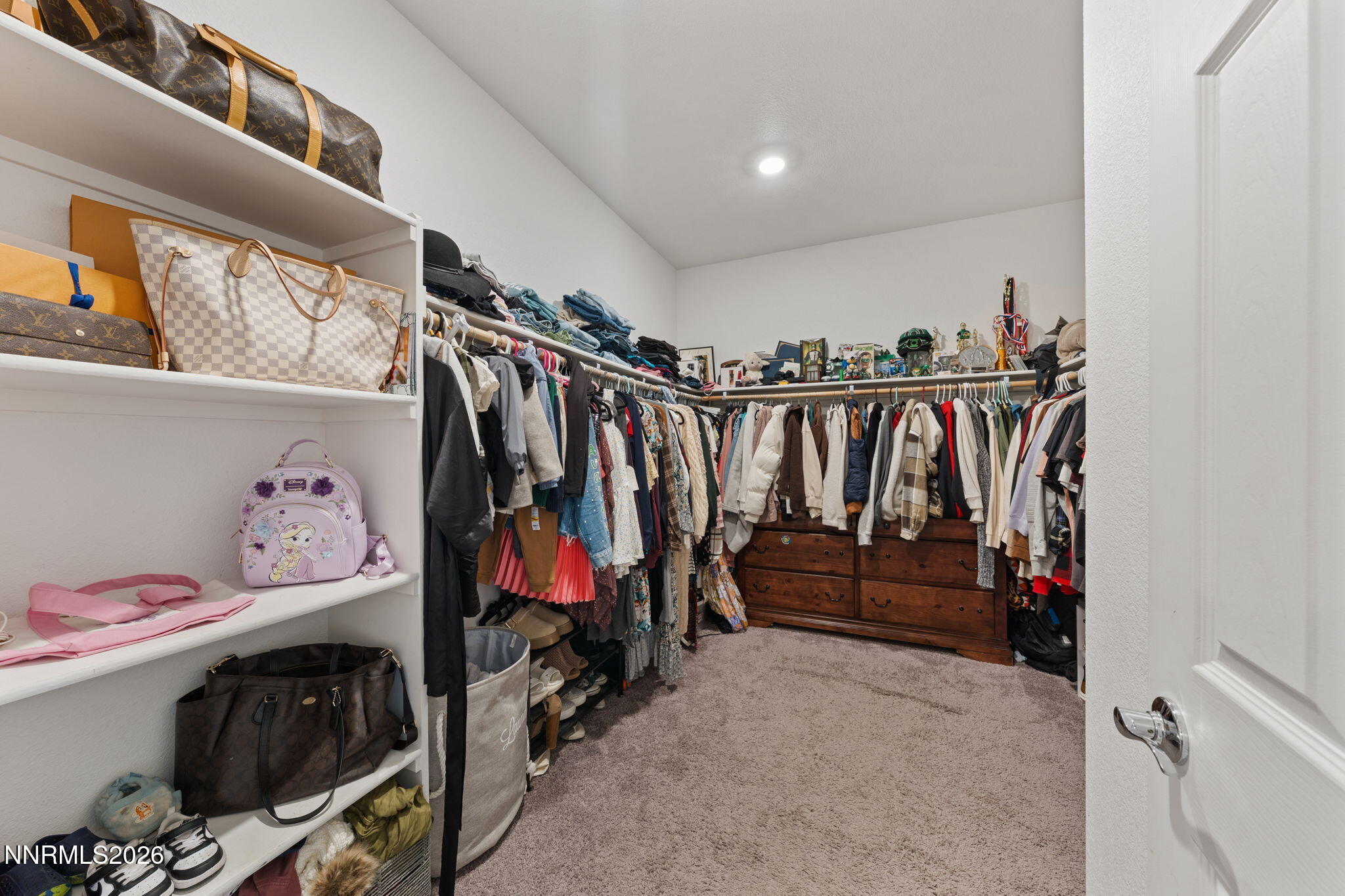 9708 Sea Glass Drive Reno, NV 89506 - Photo 22 of 51 a view of walk in closet with clothes
