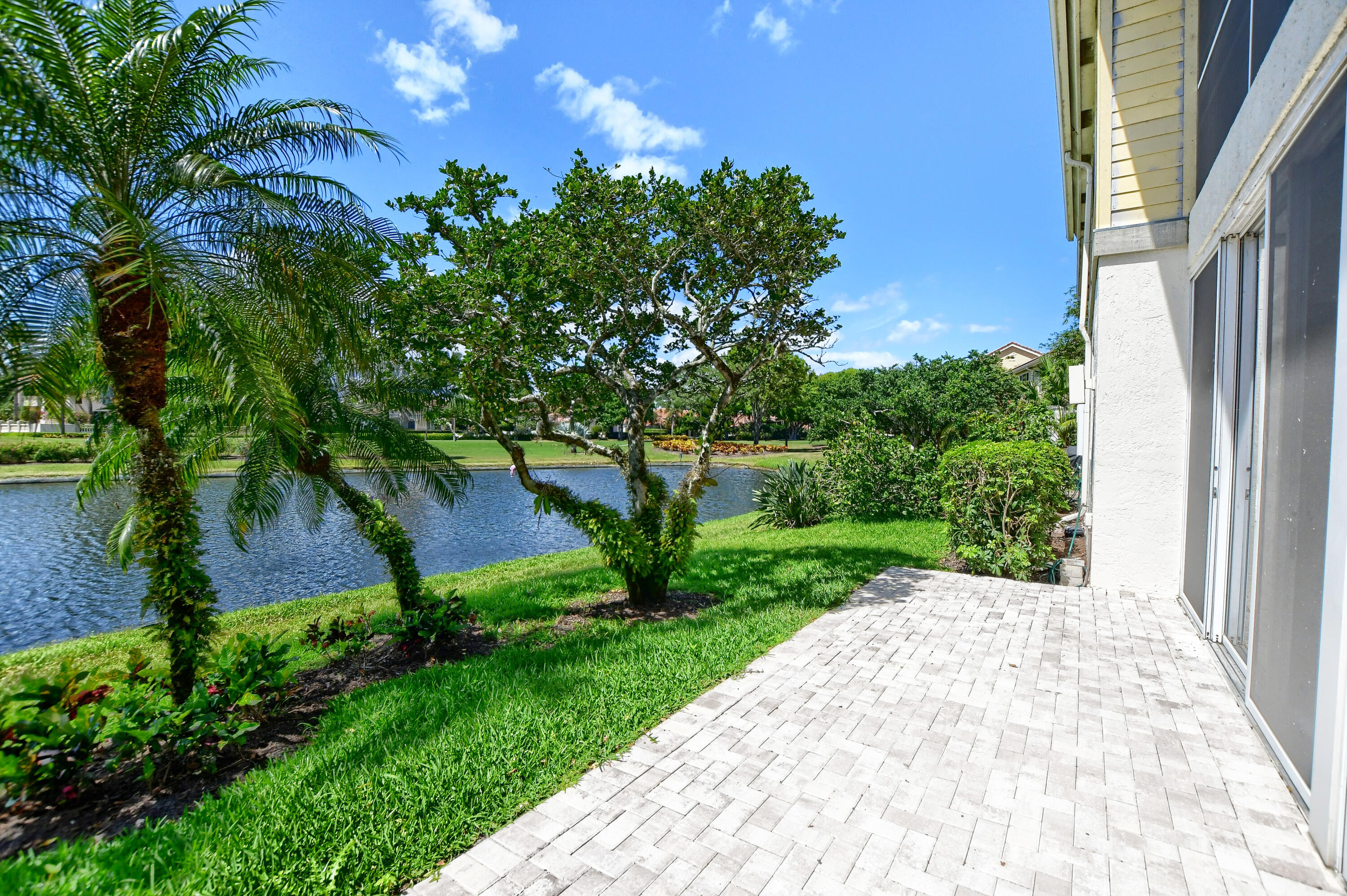 2461 Northwest 59th Street, Unit 701 Boca Raton, FL 33496 - Photo 35 of 62 OUTDOOR PATIO/LAKE VIEWS