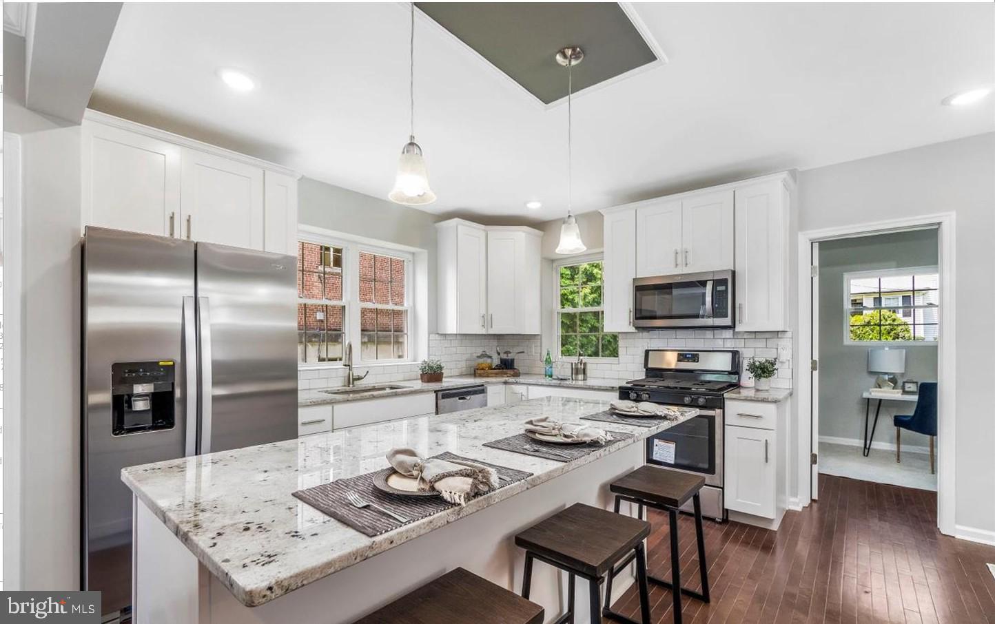 3400 Dennlyn Road Baltimore, MD 21215 - Photo 13 of 32 Modern kitchen with sleek finishes.