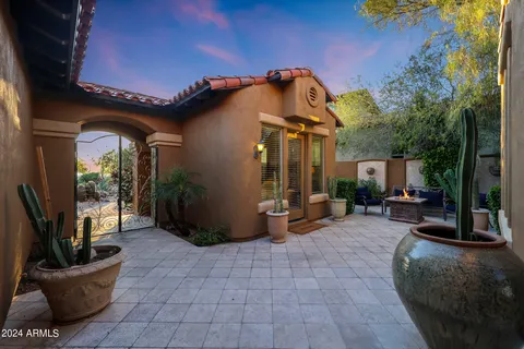 a view of a patio with swimming pool