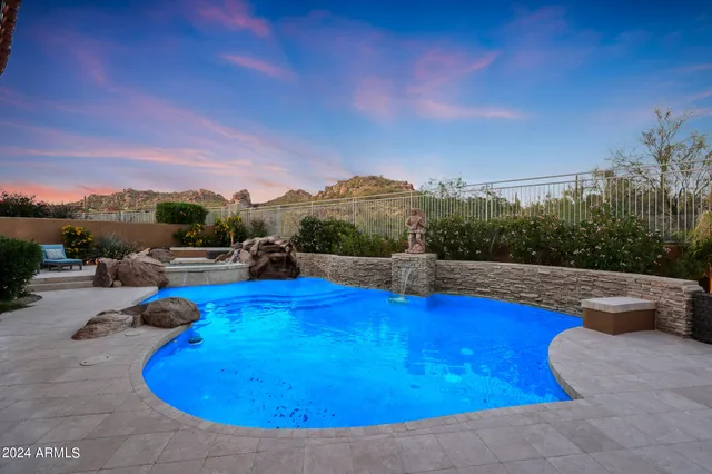 a backyard of a house with yard fire pit barbeque oven and outdoor seating
