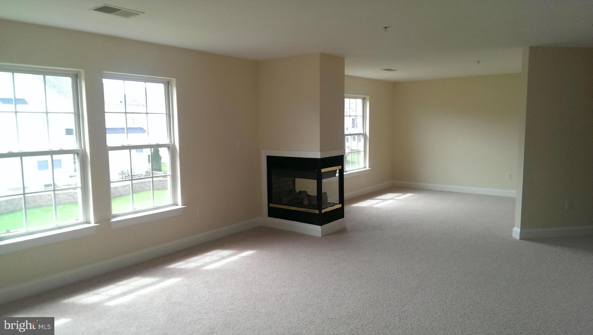 2105 Medinah Ridge Road Accokeek, MD 20607 - Photo 3 of 8 an empty room with windows