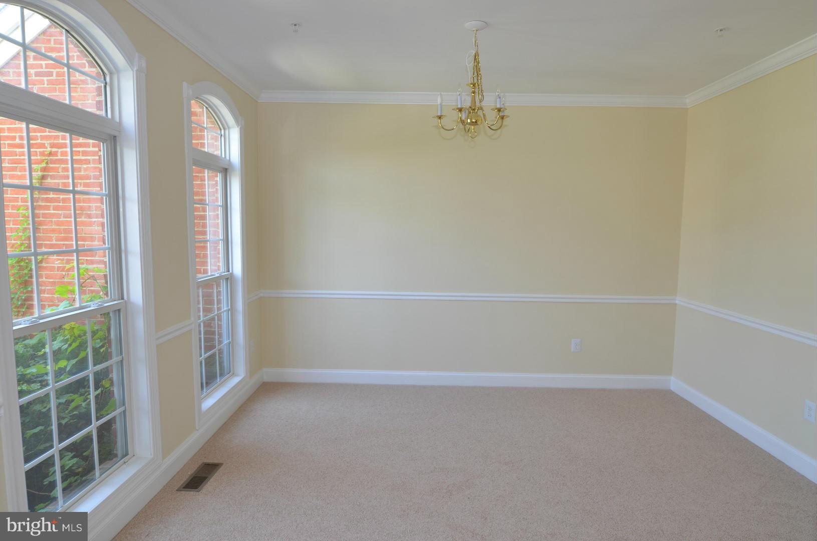 2105 Medinah Ridge Road Accokeek, MD 20607 - Photo 4 of 8 a view of an empty room with a window