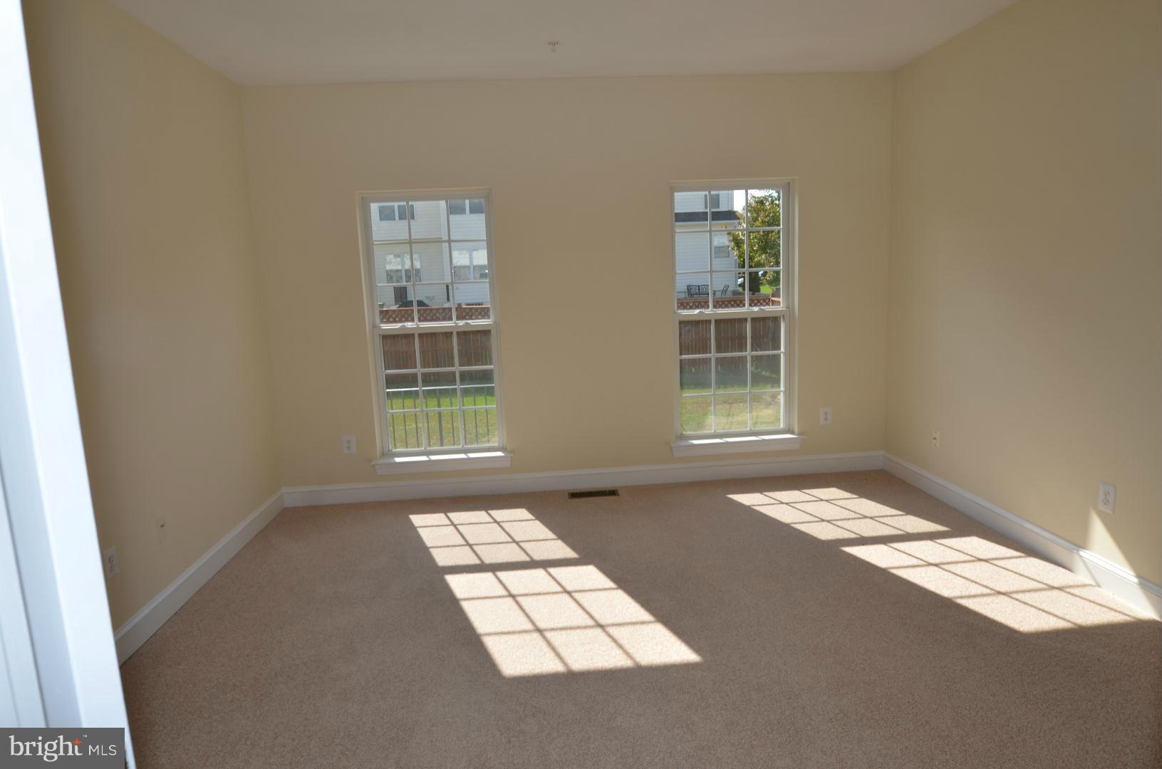 2105 Medinah Ridge Road Accokeek, MD 20607 - Photo 8 of 8 a view of an empty room with windows