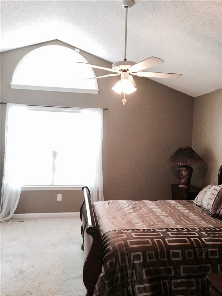 169 Ridge Drive Garner, NC 27529 - Photo 14 of 20 Arched window in master gives great light Master Bedroom