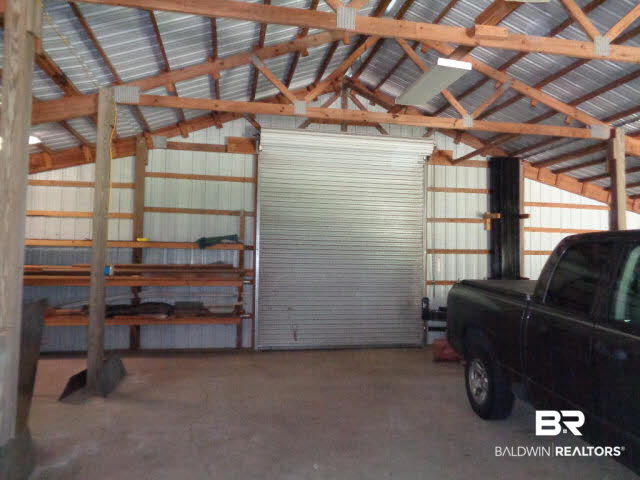 28202 Vargo Lane Elberta, AL 36530 - Photo 36 of 45 Has 2 12 foot doors located on front and rear of the building.