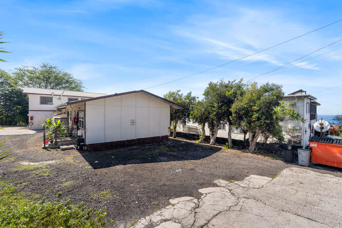 75-164 Lunapule Road Kailua-Kona, HI 96740 - Photo 19 of 27 a view of a backyard of the house