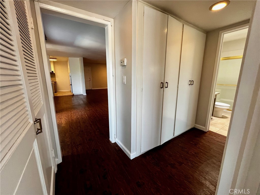 4140 Warner Boulevard, Unit 310 Burbank, CA 91505 - Photo 14 of 18 a view of a hallway with wooden floor