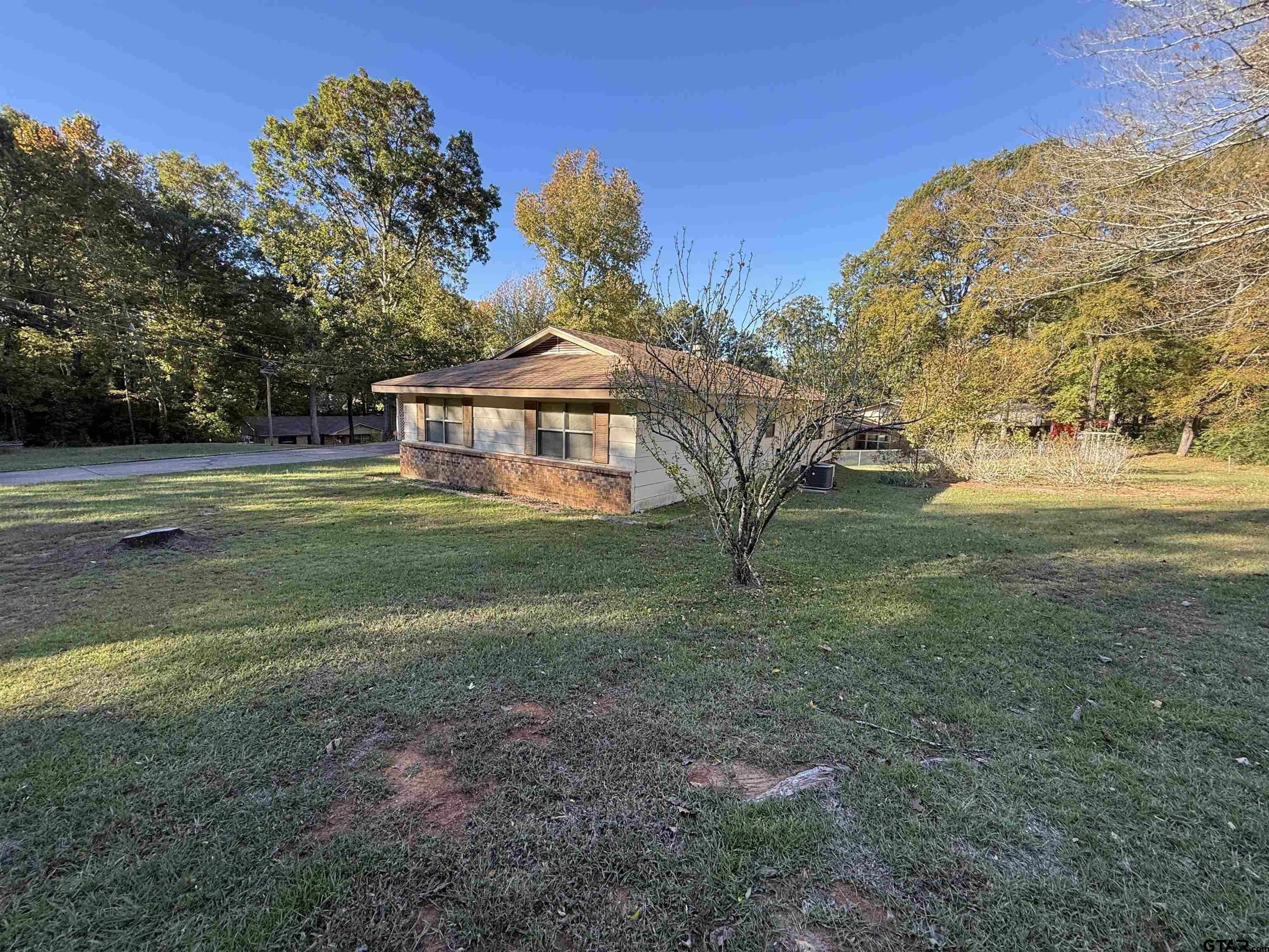 226 Caroline Street Rusk, TX 75785 - Photo 2 of 21 a view of a house with a big yard
