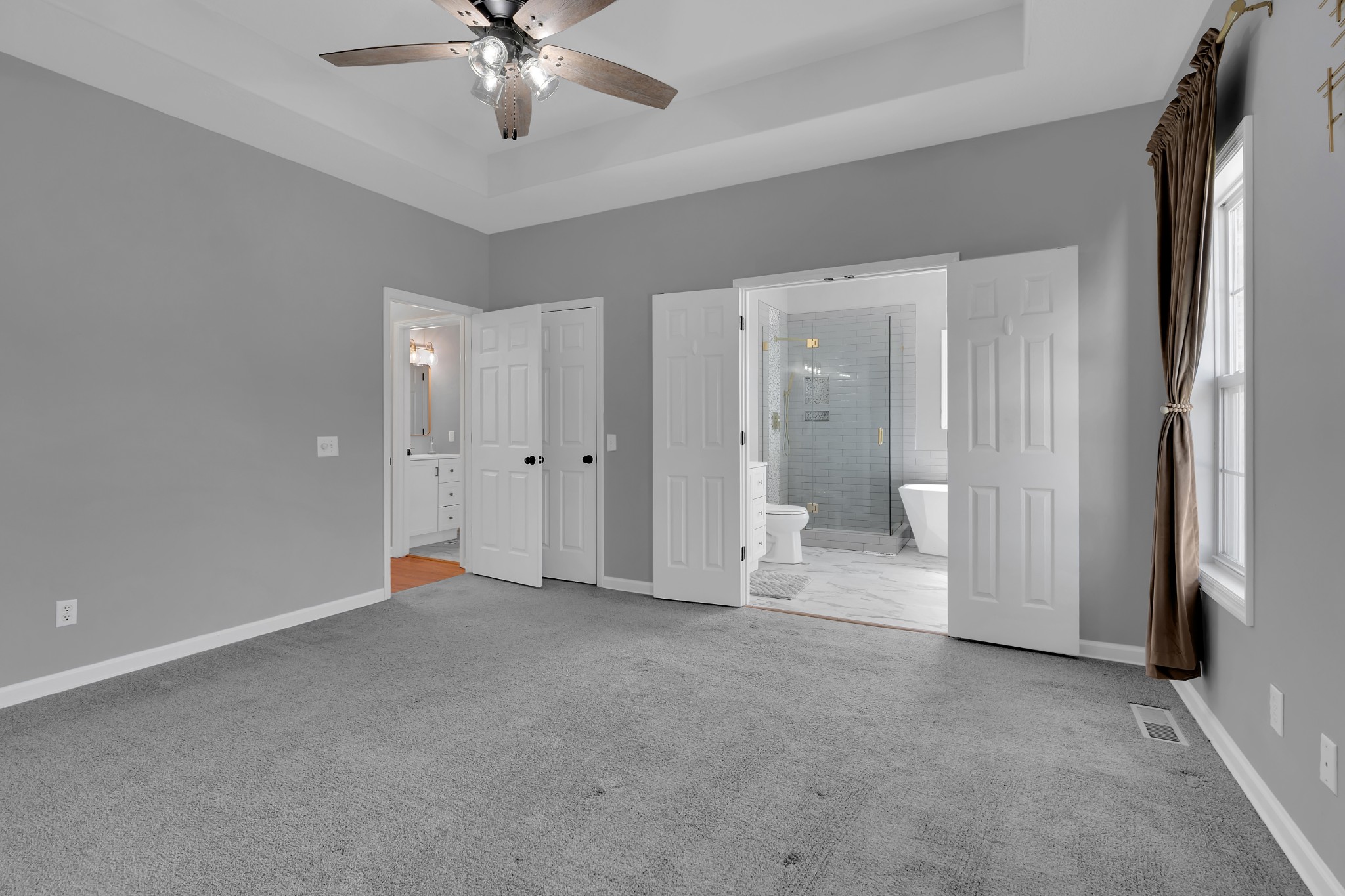 3896 Lynchburg Road Winchester, TN 37398 - Photo 24 of 57 a view of empty room with a ceiling fan and bathroom