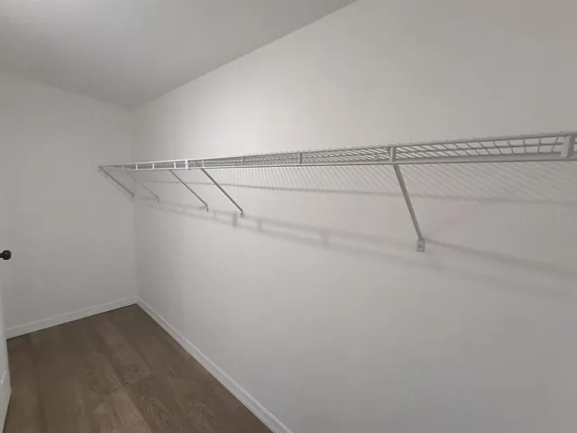 a bathroom with 2 sink and a mirror