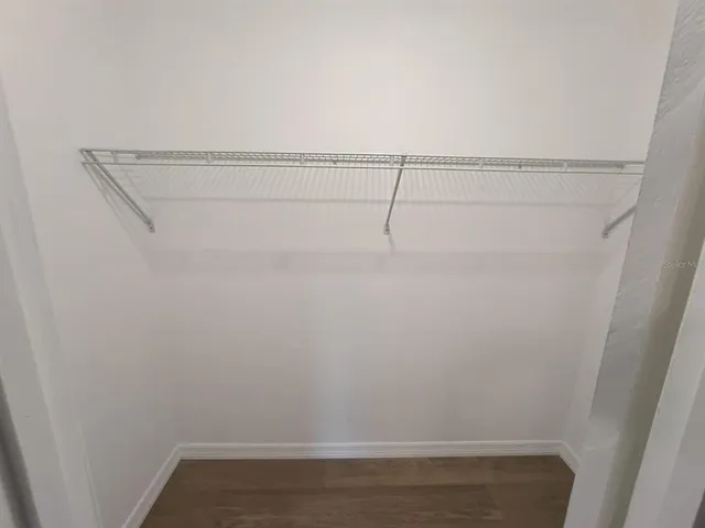 a view of swimming pool from a balcony