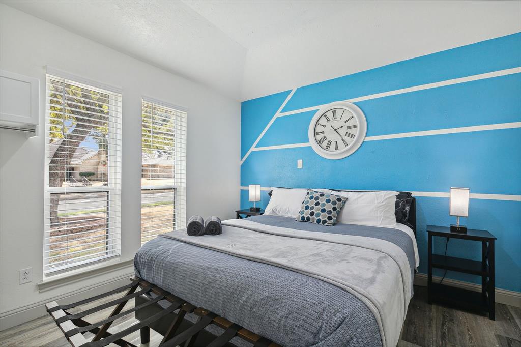 1813 Cross Bend Road Plano, TX 75023 - Photo 11 of 30 a bedroom with a bed and a window