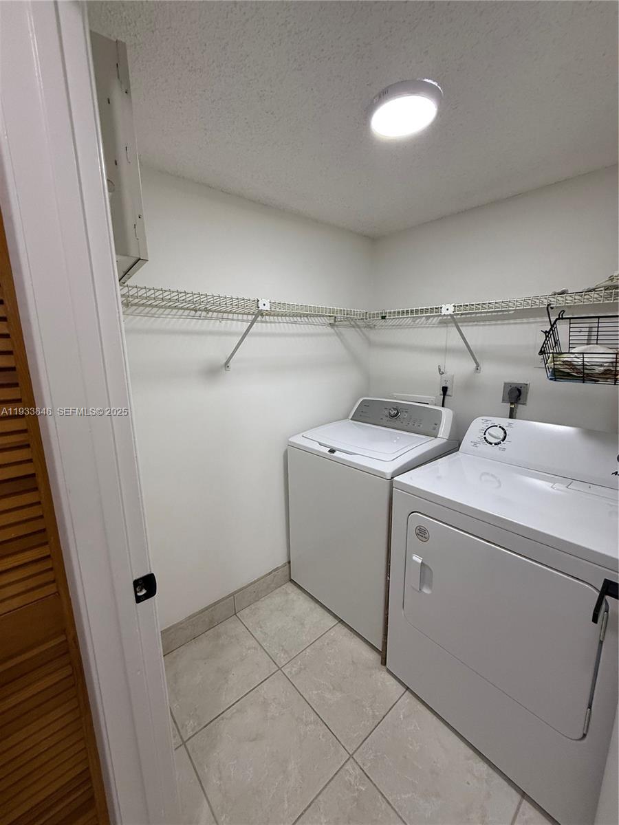 9010 Southwest 125th Avenue, Unit G307 Miami, FL 33186 - Photo 4 of 25 Internal Laundry Room