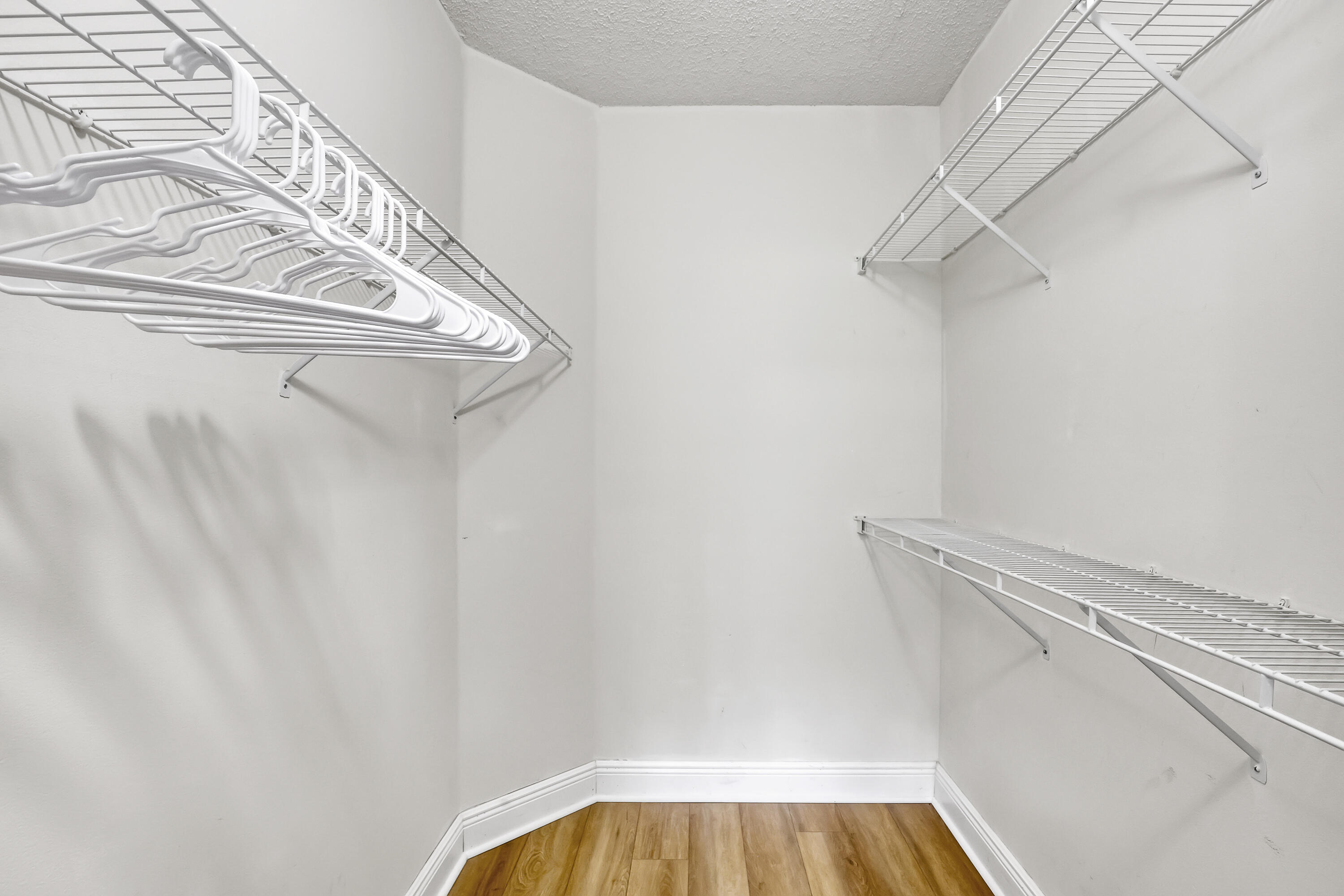 11790 St Andrews Place, Unit 105 Wellington, FL 33414 - Photo 25 of 55 a view of small space with racks on the wall