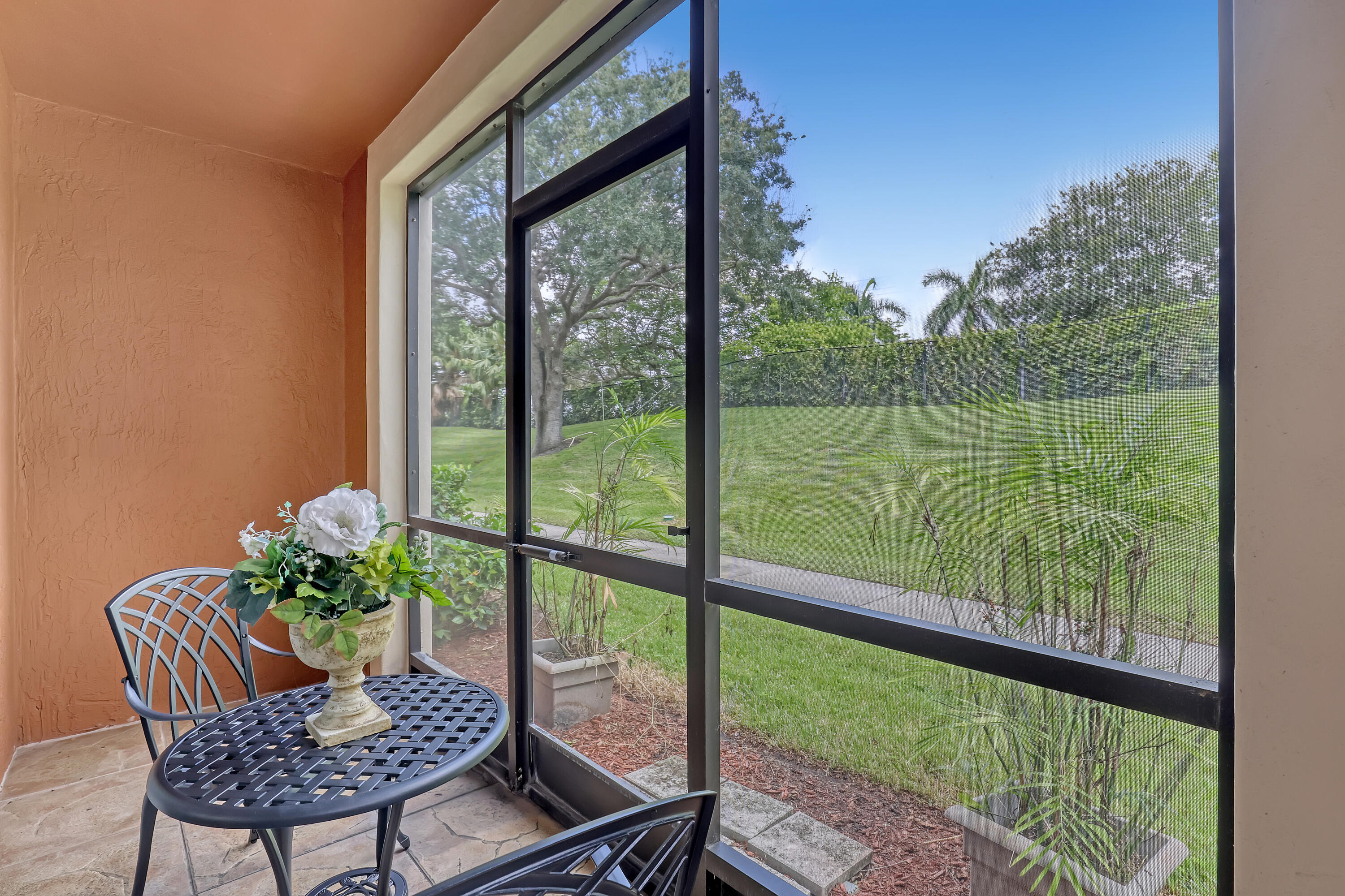 11790 St Andrews Place, Unit 105 Wellington, FL 33414 - Photo 30 of 55 a view of a room with a furniture from a balcony