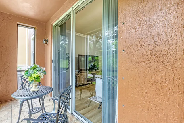 a view of a park with large trees