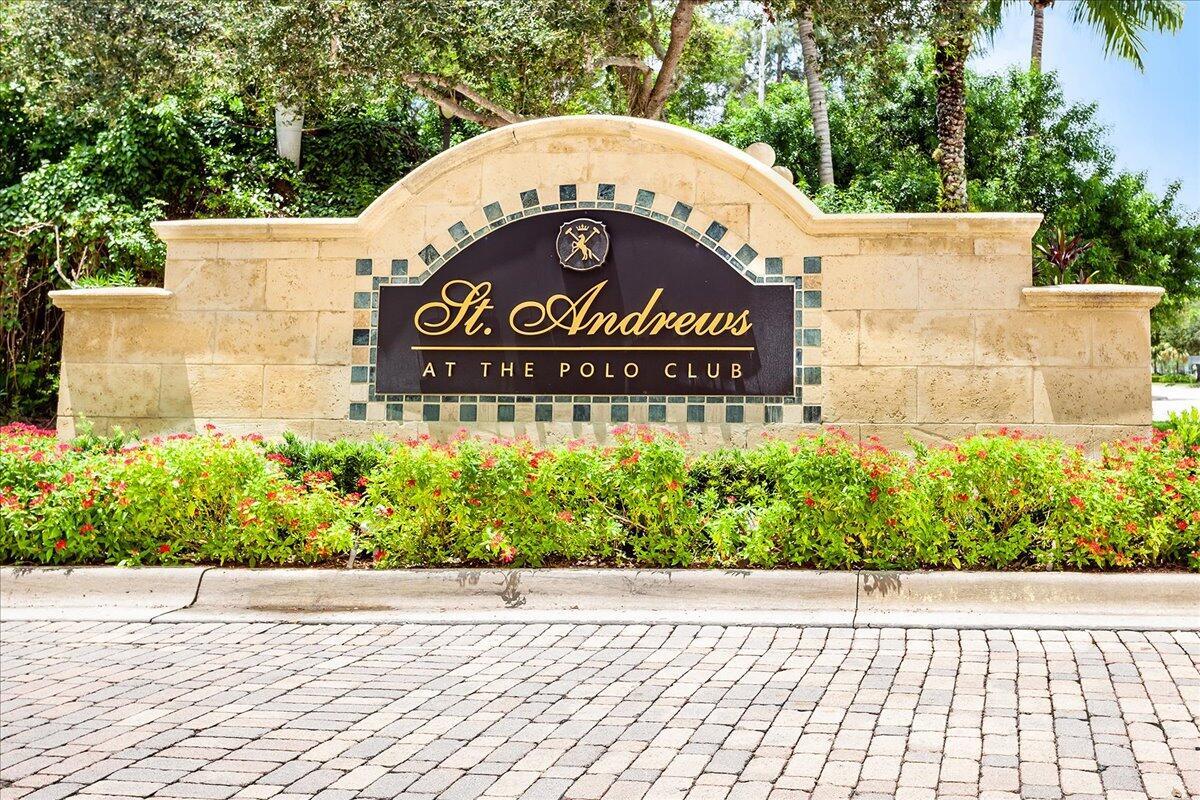 11790 St Andrews Place, Unit 105 Wellington, FL 33414 - Photo 35 of 55 a sign on the side of a building