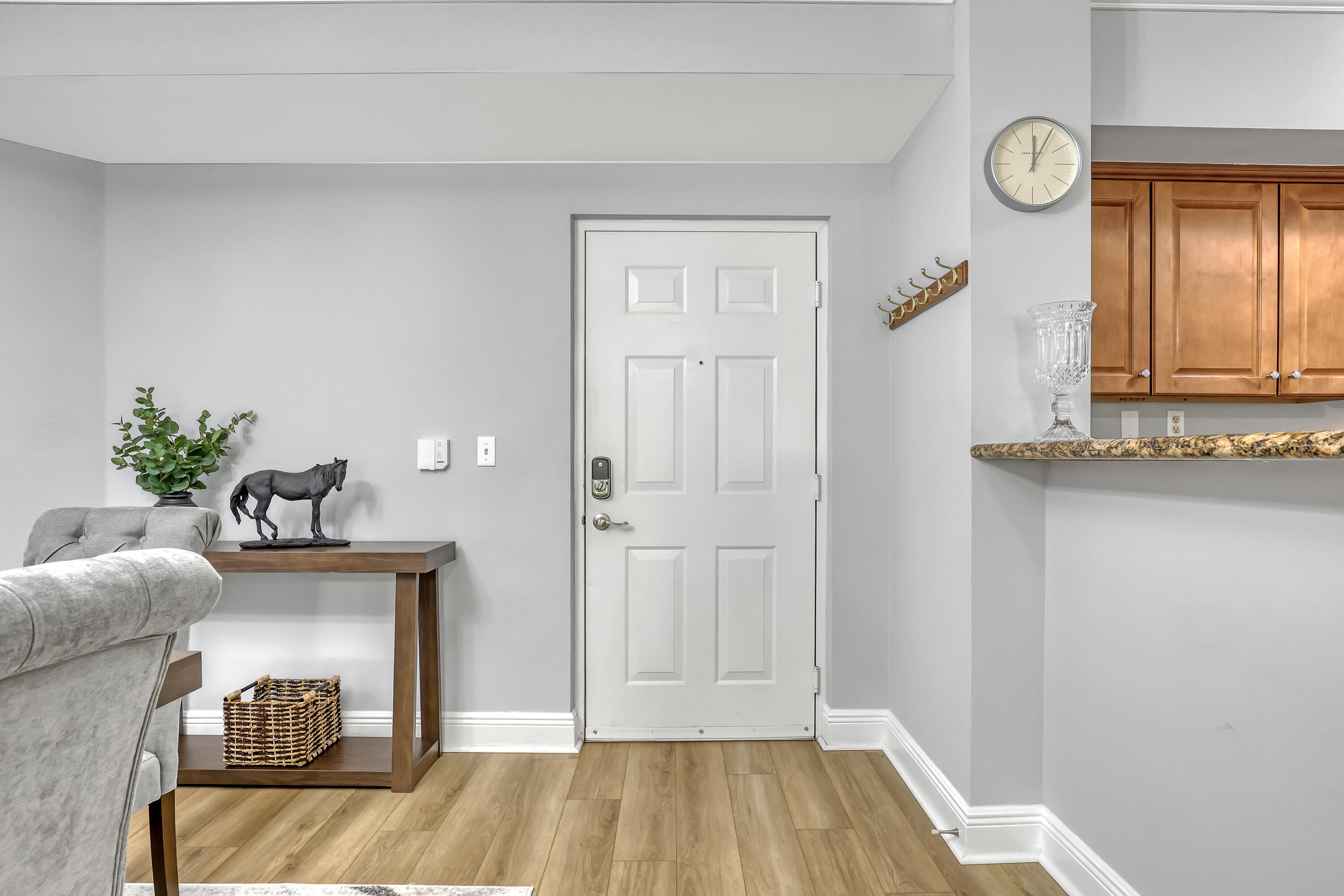 11790 St Andrews Place, Unit 105 Wellington, FL 33414 - Photo 4 of 55 a view of livingroom with furniture and wooden floor