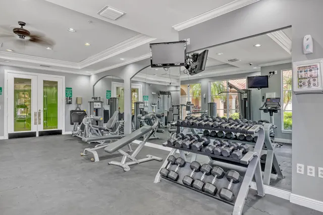 a view of a patio with a table and chairs
