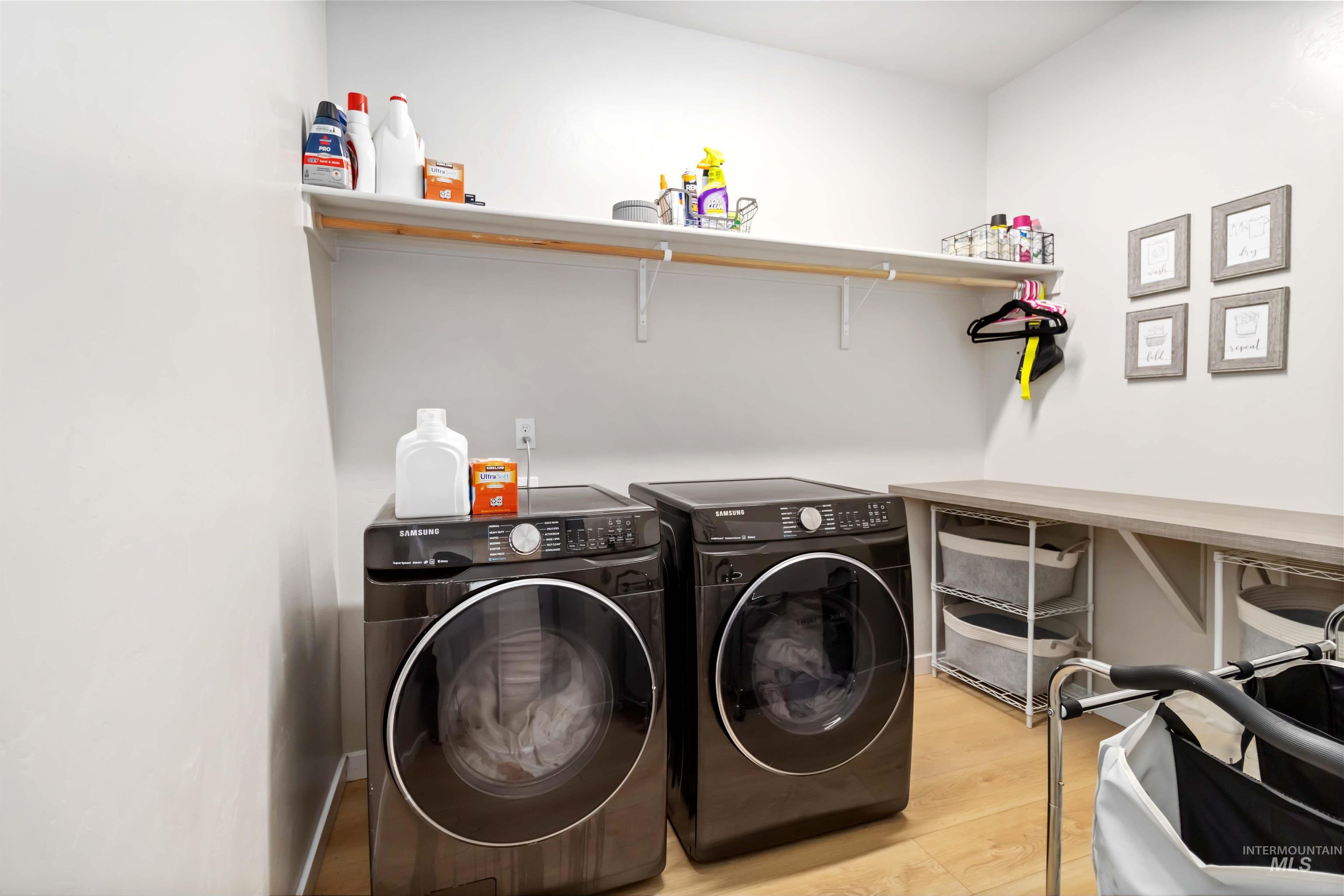 892 North Chastain Lane Eagle, ID 83616 - Photo 24 of 45 Washroom featuring light wood-style floors and washer and clothes dryer