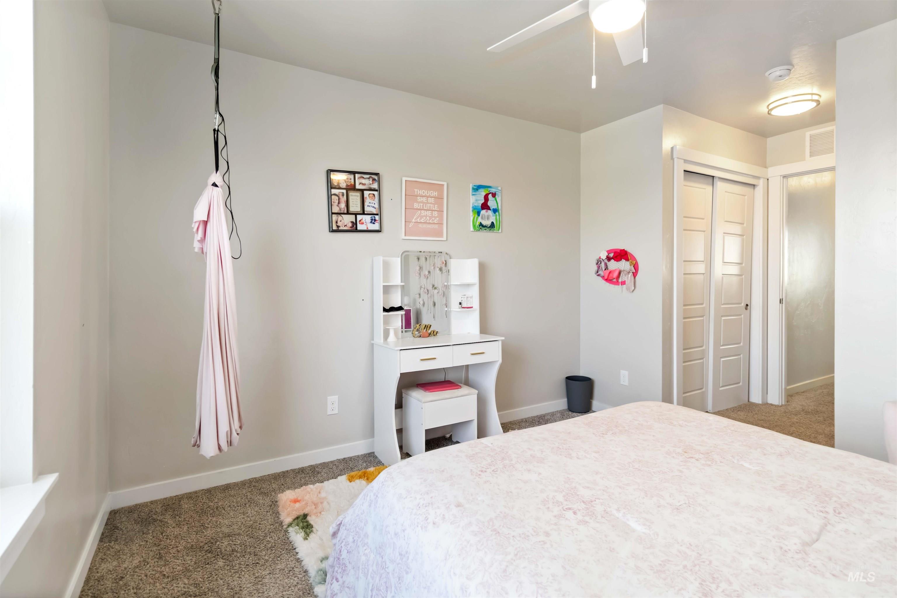 892 North Chastain Lane Eagle, ID 83616 - Photo 31 of 45 Carpeted bedroom featuring a closet and a ceiling fan