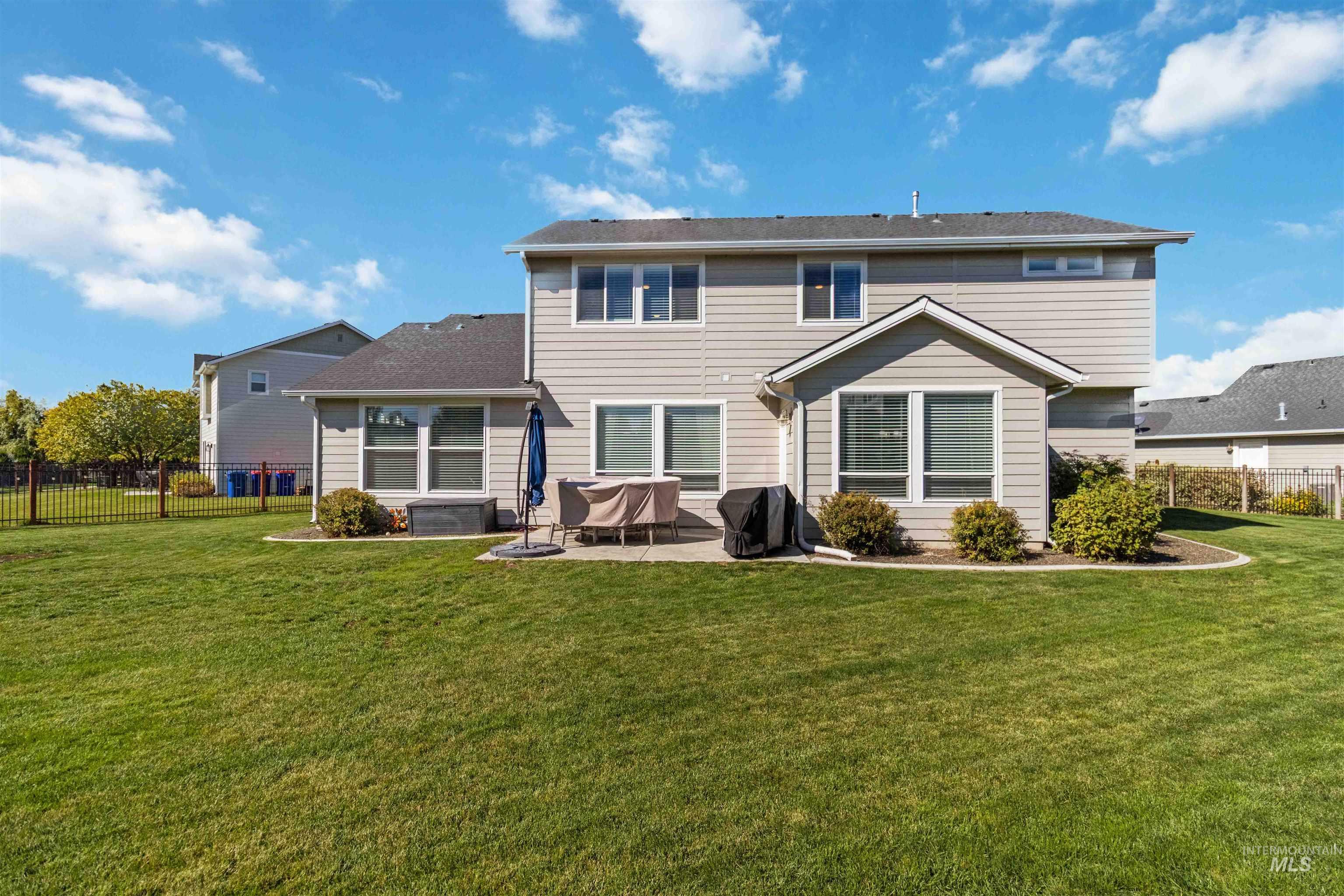 892 North Chastain Lane Eagle, ID 83616 - Photo 40 of 45 Back of property with a patio area