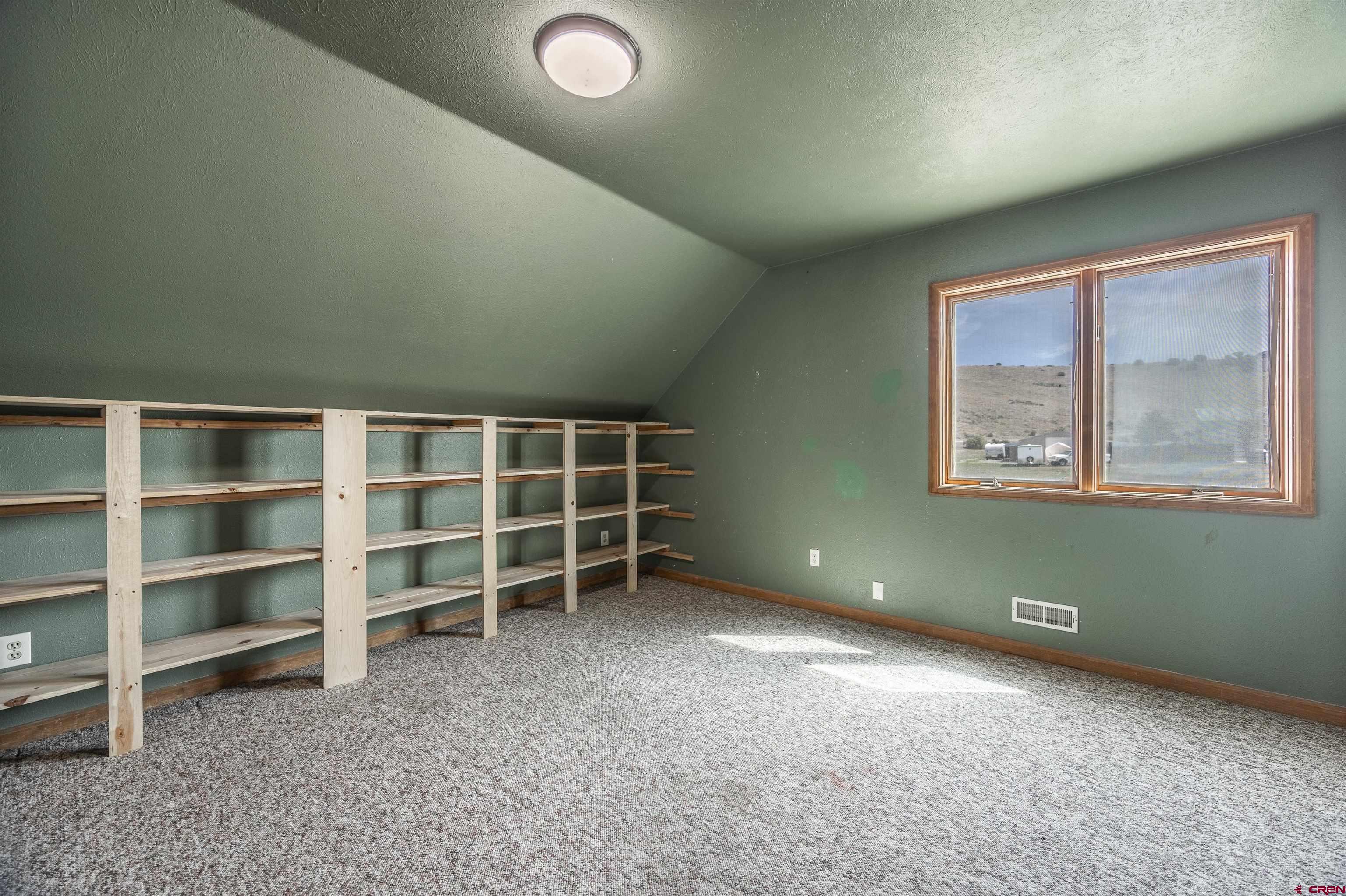 19555 6575th Road Montrose, CO 81403 - Photo 19 of 36 a view of an empty room with a window