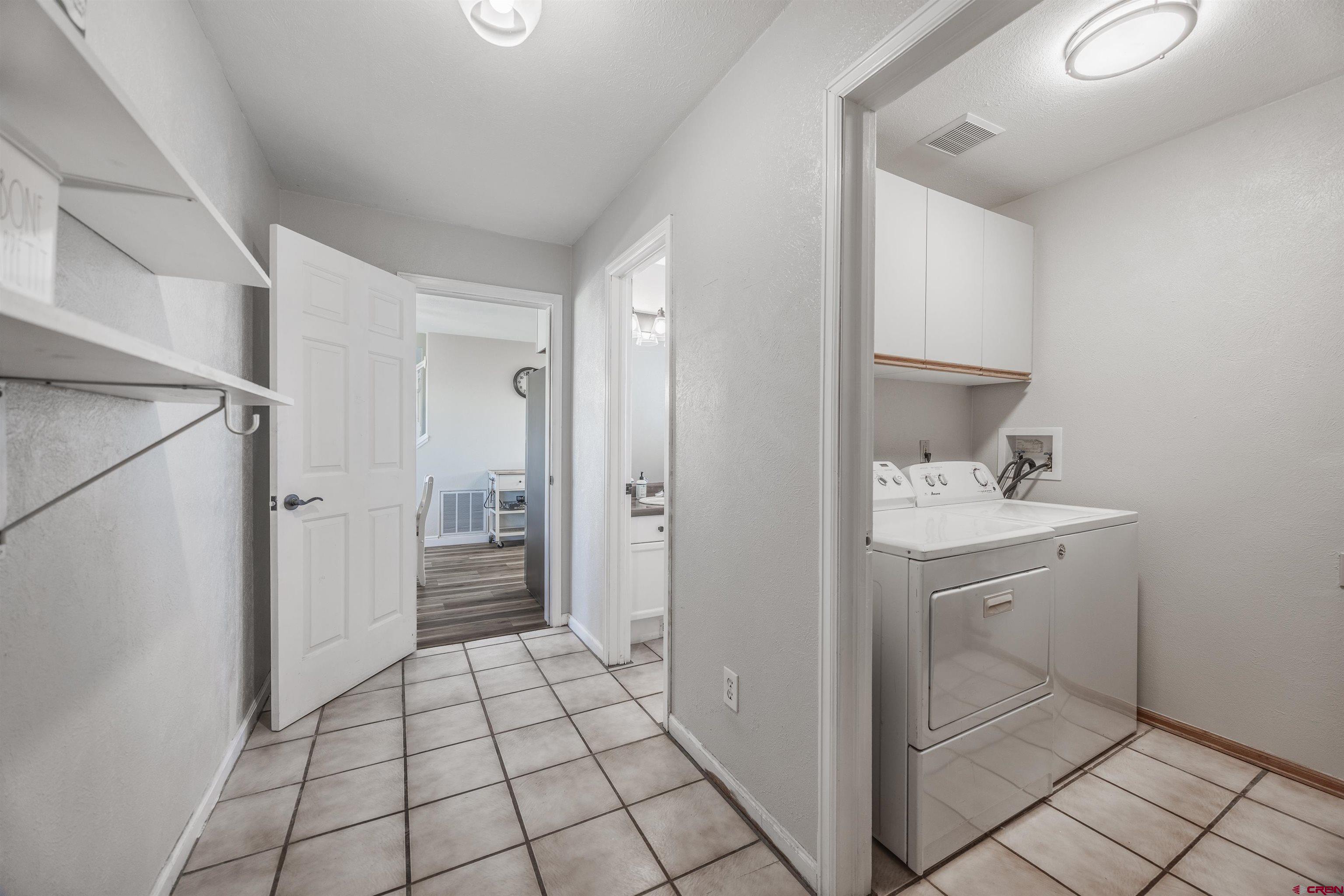 19555 6575th Road Montrose, CO 81403 - Photo 21 of 36 a bathroom with a sink and a mirror