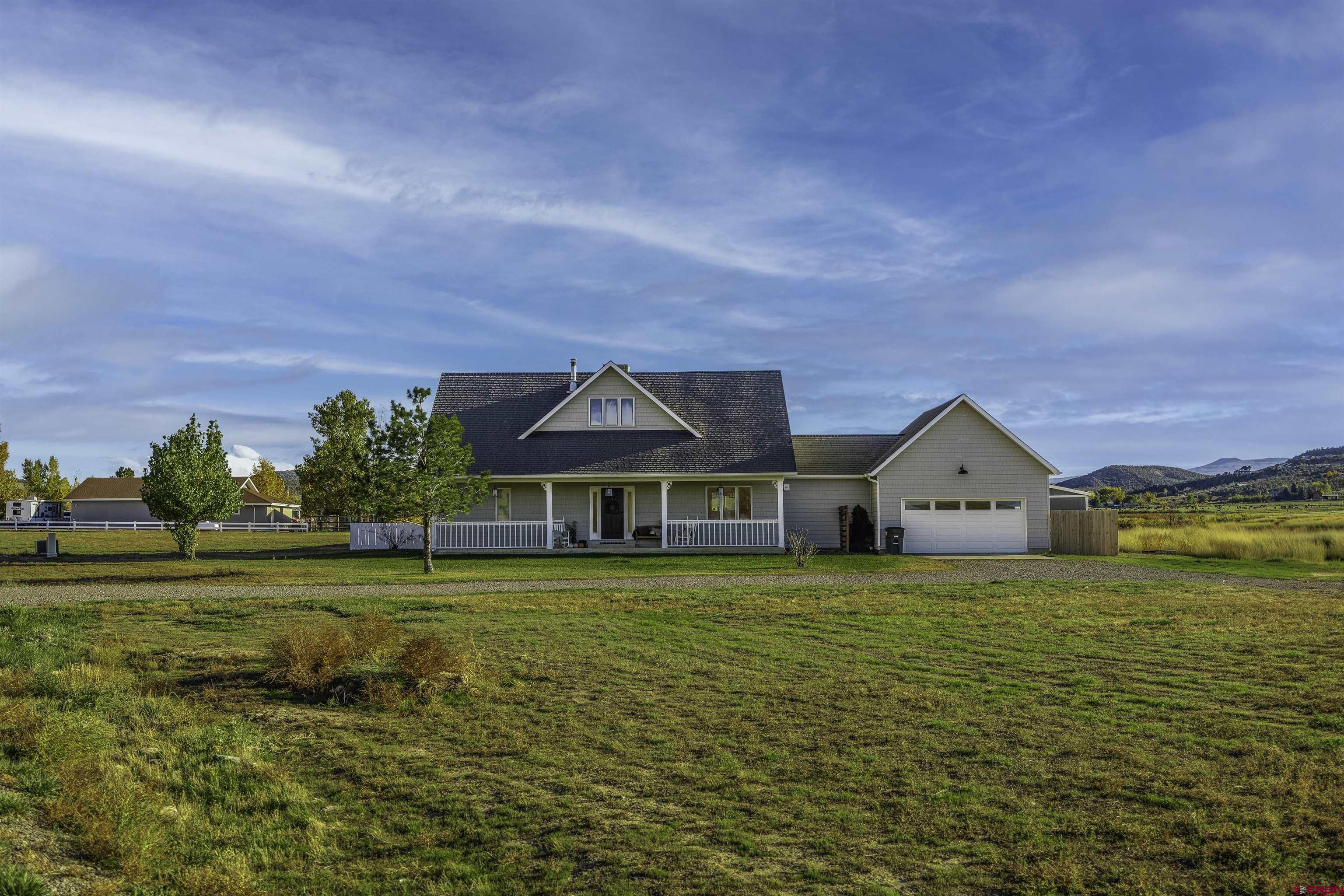 19555 6575th Road Montrose, CO 81403 - Photo 28 of 36 a view of a house with a big yard